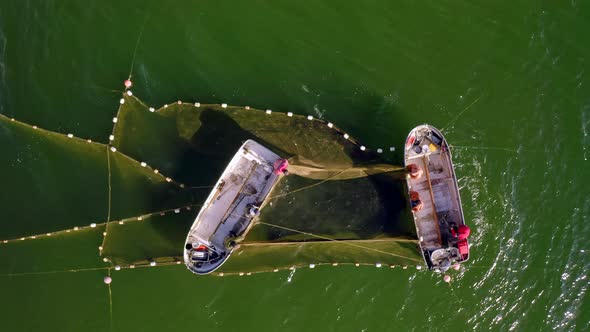 Aerial View to the Baltic Sea with the Fish Traps and Fishers