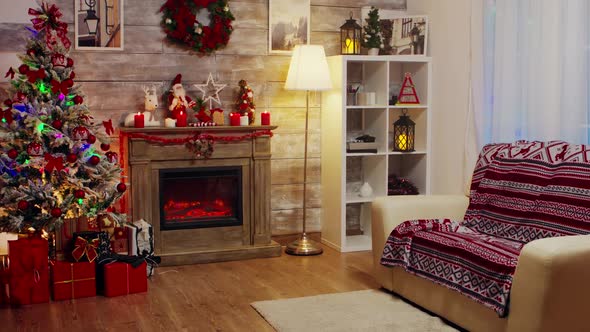 Zoom in Shot of Candles Burning on Top of Fireplace