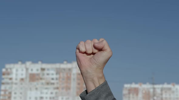 Woman Raise Her Hand on Demonstration.