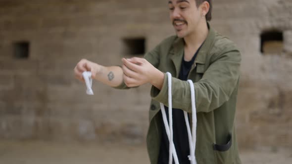 Unidentified Street Magician Performs on the Street