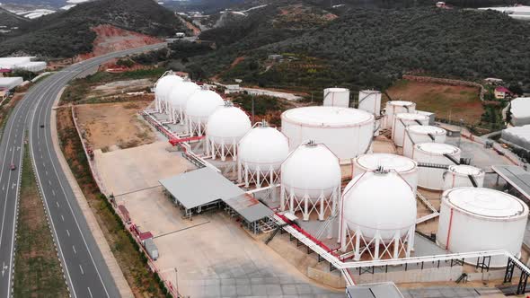 Industrial complex with tanks. Fuel storage tanks of refueling complex. Petroleum industrial.