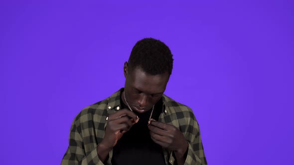 African American Guy Portrait on Blue Background