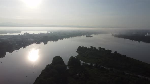 Fly over small island at Pulau Bangau river