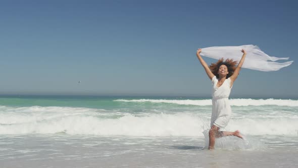 African american woman playing with the wind