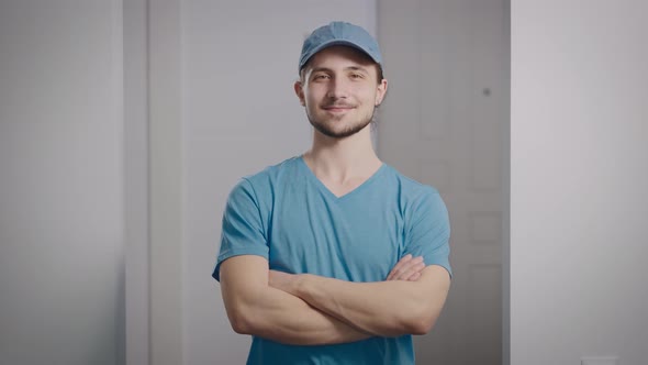 Portrait of a Positive Teenager in a Tshirt and a Cap