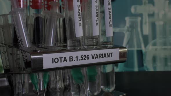 Iota B.1.526 Test Tube Samples Being Removed From Rack. Locked Off, Close Up
