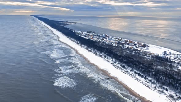 Baltic Sea in winter. Snowy Hel peninsula. Aerial view