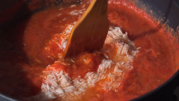 Jollof Rice in a Frying Pan Cooking