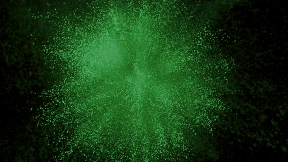 Green powder exploding on black background in super slow motion, shot with Phantom Flex 4K alt