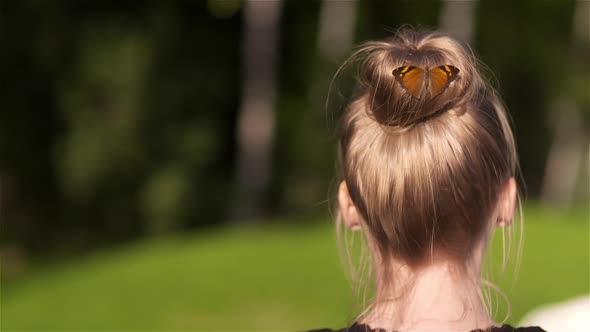 Butterfly On Hair Of Woman