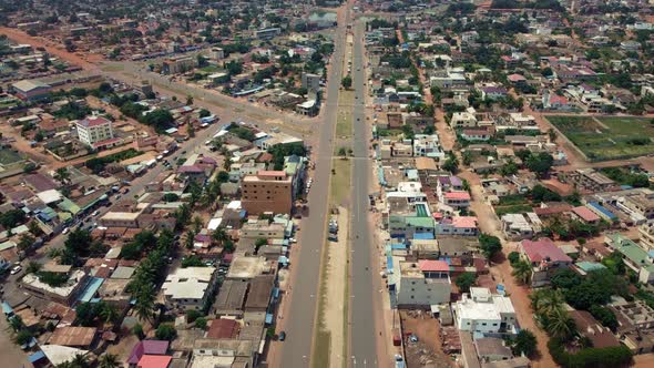 CInematic forward motion Aerial View of african city road, Lomé, Africa