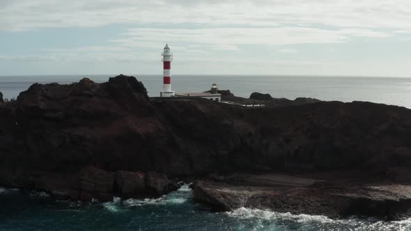 Aerial survey above the roads in Tenerife, Canary islands, lighthouse Teno