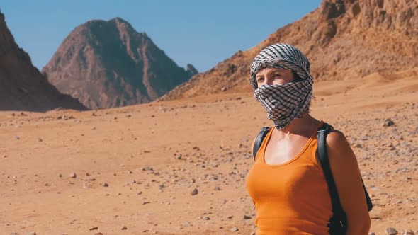 Girl in the Keffiyeh in Desert of Egypt