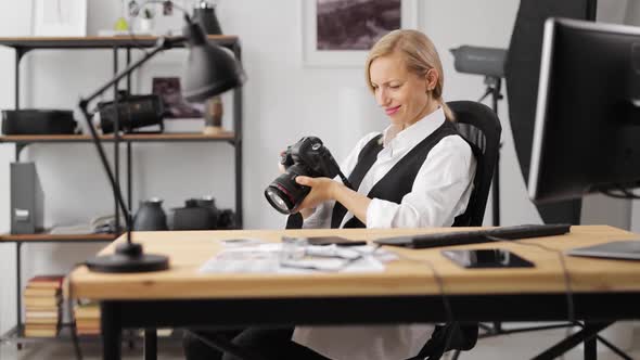 Photographer with Camera at Office