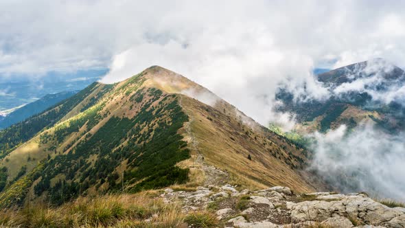 White Clouds over Alpine Mountains Misty Nature