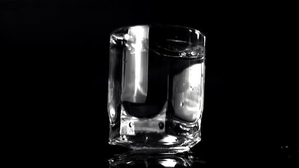 Super Slow Motion of the Glass of Water Falls on the Table
