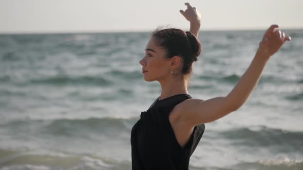 Beautiful Scene Dancing Ballerina Black Top Jeans Beach Near Ocean Sea Morning