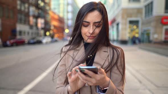 Video of Woman Typing on the Phone