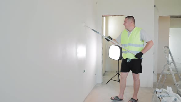 The Master Contractor Paints the Walls White with a Roller