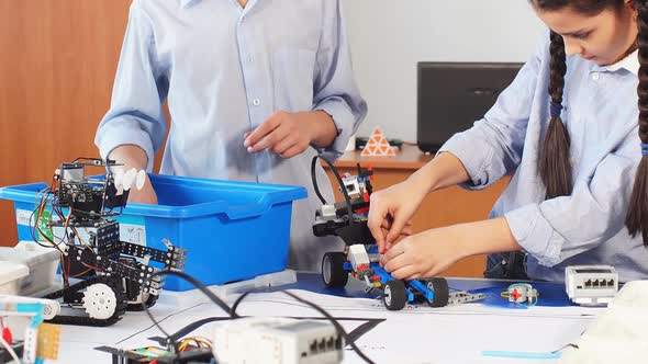 Happy Children Learn Programming Using Laptops on Extracurricular Classes