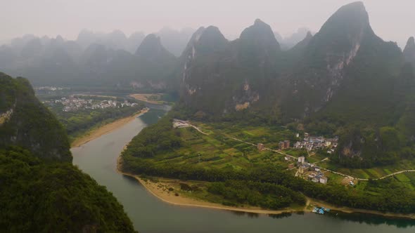 Aerial shot of the amazing rock formations along the Li River in China