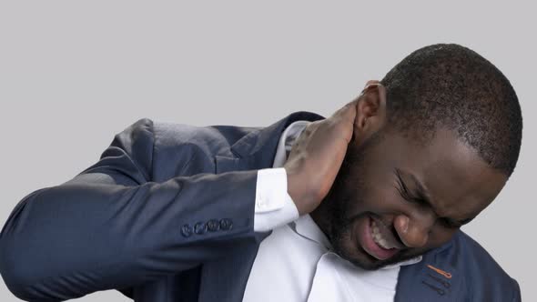 Afro-American Man Suffering From Neck Pain