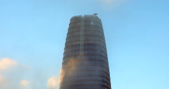 SAN FRANCISCO, CALIFORNIA, USA. October, 2018. Thick Clouds Surrounding Tall Skyscraper in a Sunny