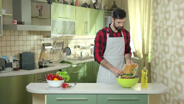 Guy Cutting Cucumber