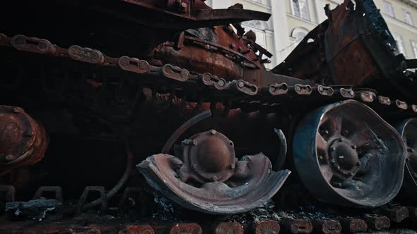Caterpillar and Wheels Track of Burnedout Russian Tank