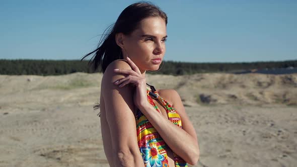 Slim Woman in Swimwear Looking Away