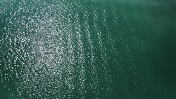 Turquoise Blue Ocean Water From Above on a Sunny Day