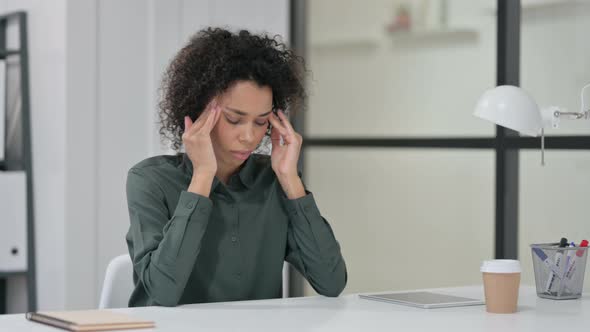 African Woman Having Headache Work