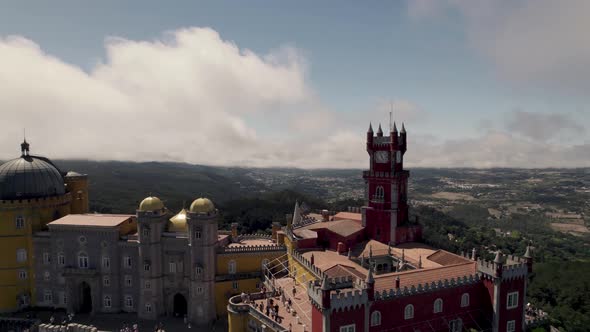 Visitors at the Pena Palace, jewel in the crown of Sintra Hills, Portugal.