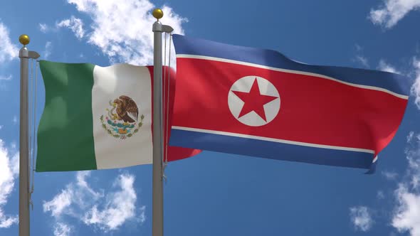 Mexico Flag Vs North Korea Flag On Flagpole