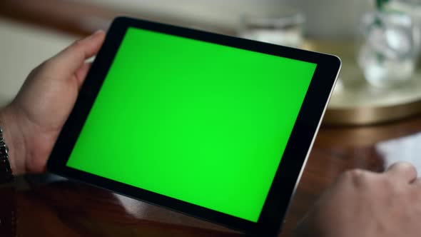 Closeup Chroma Key Tablet in Businessman Hands