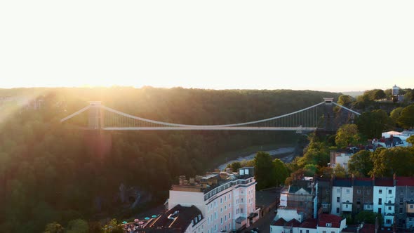 Cinematic dolly back drone shot of Clifton suspension bridge Bristol at sunset