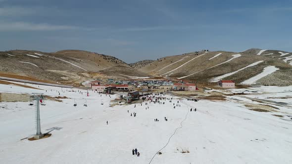 Snowy Mountains And Ski Center Aerial View 