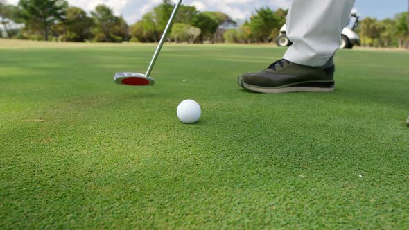 Golfer playing golf