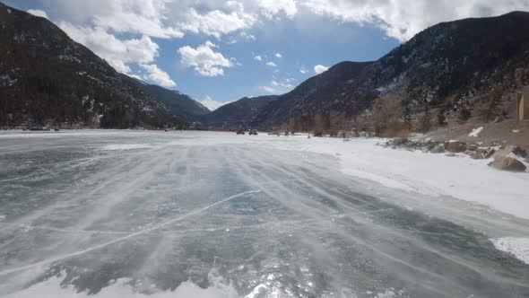 Snow blowing across the frozen Georgetown Lake in Colorado, slowmo