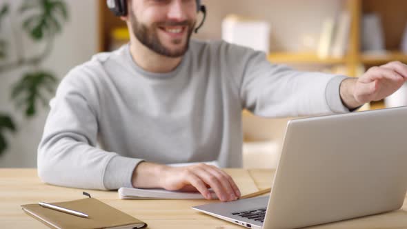 Man Ending Video Call and Smiling for Camera