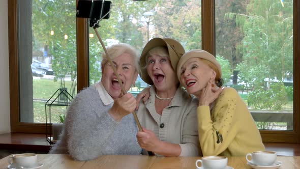 Three Women with Selfie Stick