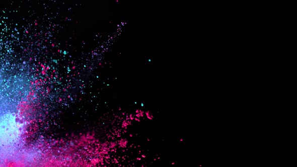 Super Slowmotion Shot of Color Powder Side Explosion Isolated on Black Background at 1000Fps.