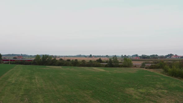 Italian train passing on railway