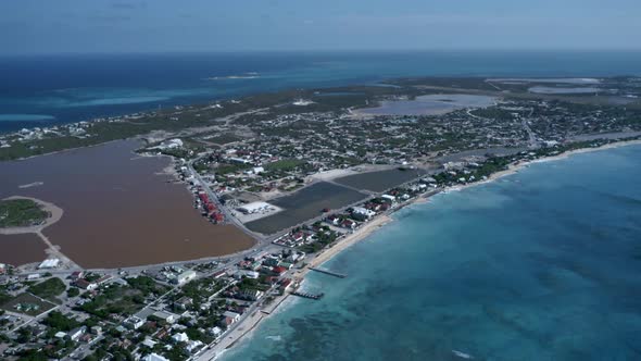 Aerial view of Cockburn Town with saline lake, Grand Turk,Turks and Caicos
