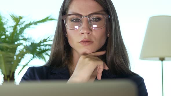 Young Business Woman Working on Computer