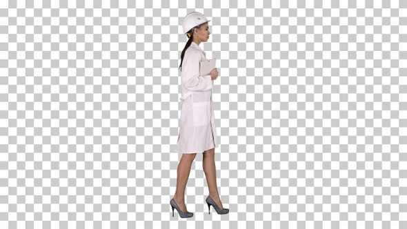 Attractive Hispanic woman in white lab coat and white safety