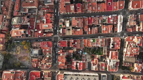 Aerial drone view of Barcelona, Spain. Blocks with multiple residential buildings, park