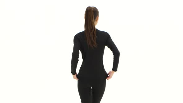 Girl Advertises Clothes. White Background. Back View