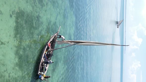 Tanzania Vertical Video  Boat Boats in the Ocean Near the Coast of Zanzibar Aerial View