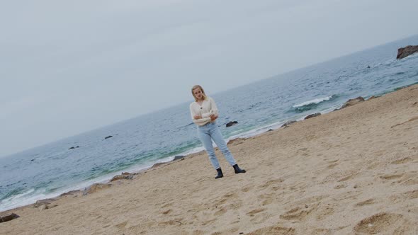 Portrait of Stylish Woman On Ocean Coast